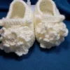 Blossom Baby Girl Booties, view 1 Cream crochet baby girl booties with blossom bobble detail
