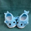 Blue Whale Baby Booties, view 1 Light blue crochet whale baby booties