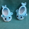 Blue Whale Baby Booties, view 4 Light blue crochet whale baby booties