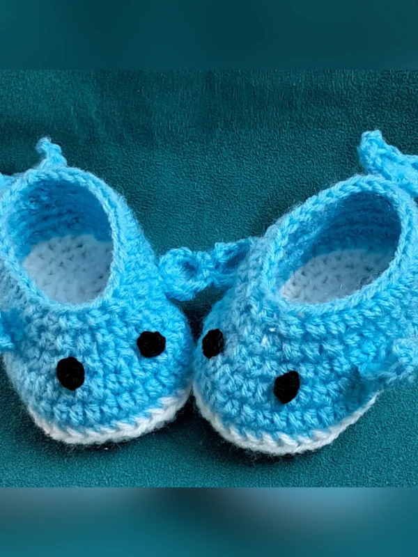 Blue Whale Baby Booties, view 5 Light blue crochet whale baby booties