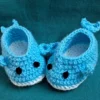 Blue Whale Baby Booties, view 6 Light blue crochet whale baby booties