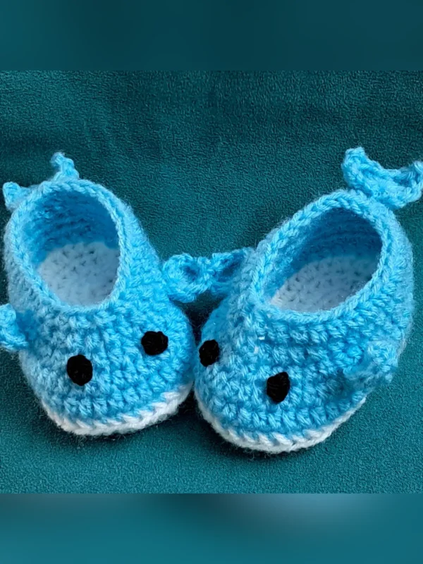Blue Whale Baby Booties, view 6 Light blue crochet whale baby booties